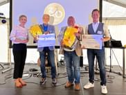 Verena Sonnenberg und Thomas Schmid ehren die Firmengründer Herbert Würtinger und Walter Schmid