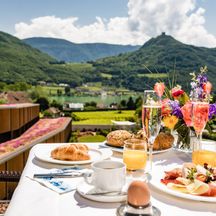 Delicious breakfast with a mountain view and blue sky