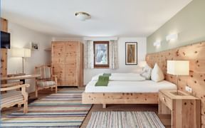 Swiss pine room at Biohotel Stillebach, nestled in the Tyrolean Alps Swiss pine room at Biohotel Stillebach, nestled in the Tyrolean Alps