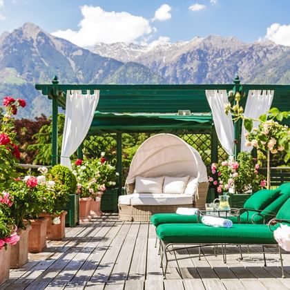 Terrace with deckchairs at the Hotel Pienzenau